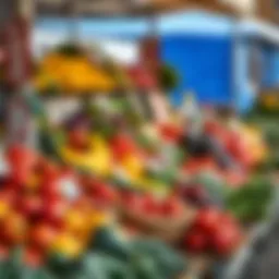 Colorful fresh fruits and vegetables displayed at an outdoor market stall in Knysna